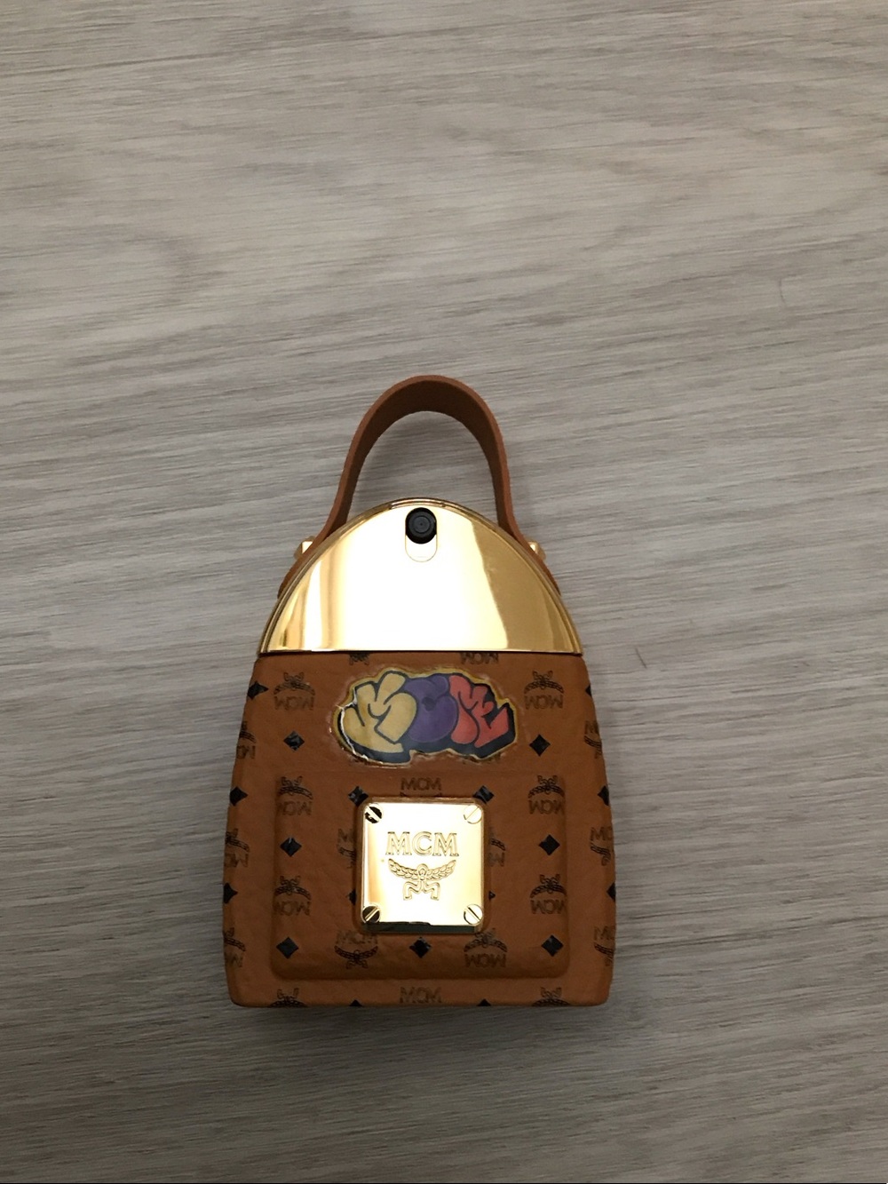 MCM Cognac Logo-Print Mini Bag with Gold Top and Multicolor Patch, 1.7 oz